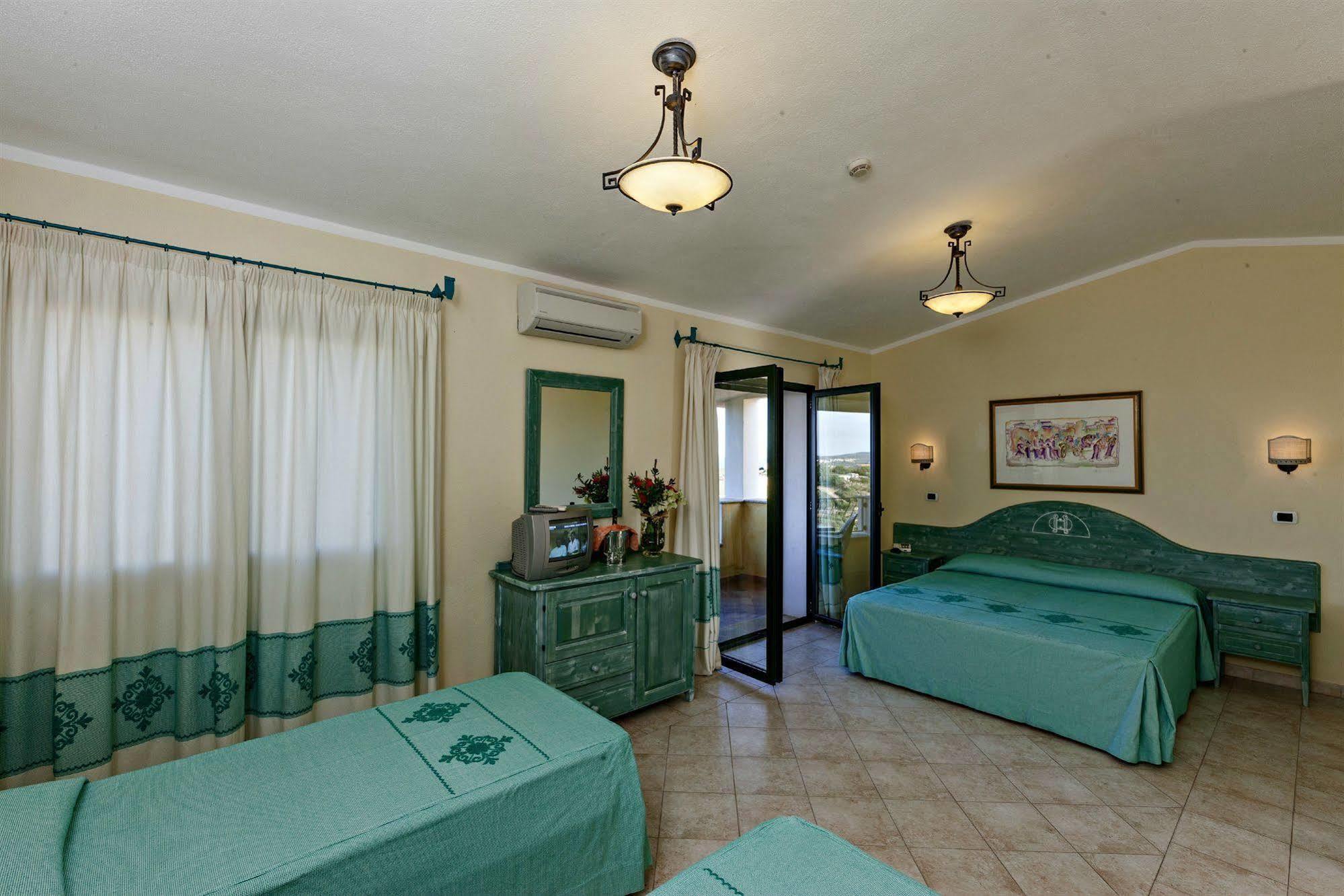 Club Hotel Baia Aranzos Golfo Aranci Buitenkant foto